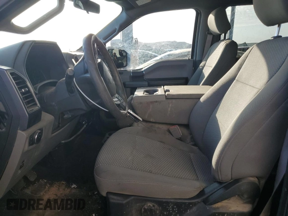 2018 Ford F-150 XL with VIN 1FTEW1E58JFA19859, listed as a Copart auction lot 63862625 with 77,463 mi miles and Salvage title. Bid and sale history available at DreamBid. Image 7.