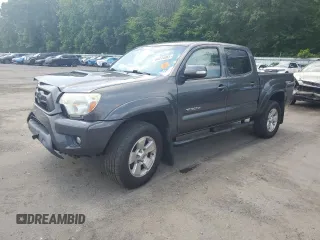 2015 Toyota Tacoma with VIN 3TMLU4EN7FM185201, listed as a Copart auction lot 64014065 with 98,913 mi miles and Salvage title. Bid and sale history available at DreamBid. Image 1.