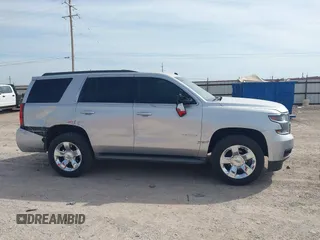 2015 Chevrolet Tahoe LT with VIN 1GNSCBKC9FR111984, listed as a IAAI auction lot 42003685 with 186,391 mi miles and . Bid and sale history available at DreamBid. Image 13.