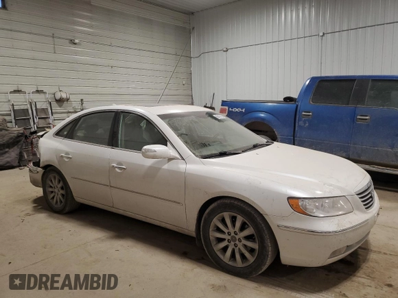 2009 Hyundai Azera Limited z VIN KMHFC46F09A372929, wystawiony jako Copart lot #88455705 z przebiegiem 111 222 mil mil oraz Szkoda całkowita • Salvage title. Historia ofert i sprzedaży dostępna na DreamBid. Obrazek 4.