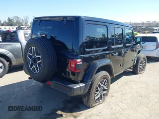 2024 Jeep Wrangler Sahara with VIN 1C4PJXEN9RW111214, listed as a IAAI auction lot 41653921 with 9,118 mi miles and . Bid and sale history available at carsss.com. Image 4.