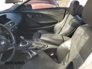 2010 BMW 6 Series 650i z VIN WBAEB5C50AC224807, wystawiony jako Copart lot #73411584 z przebiegiem 112 734 mil mil oraz Szkoda całkowita • Salvage title. Historia ofert i sprzedaży dostępna na DreamBid. Obrazek 7.