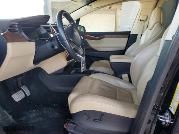 2017 Tesla Model X P100D with VIN 5YJXCDE42HF052851, listed as a Copart auction lot 75763854 with NaN miles and Salvage Title. Bid and sale history available at carsss.com. Image 7.