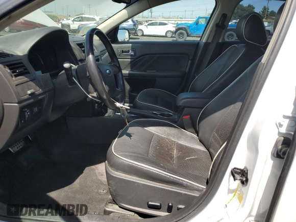 2012 Ford Fusion SEL с VIN 3FAHP0JA9CR163598, выставлен на аукционе Copart как лот 58579765 с пробегом 154 141 миль миль и Списание • Salvage title. История ставок и продаж доступна на DreamBid. Изображение 7.