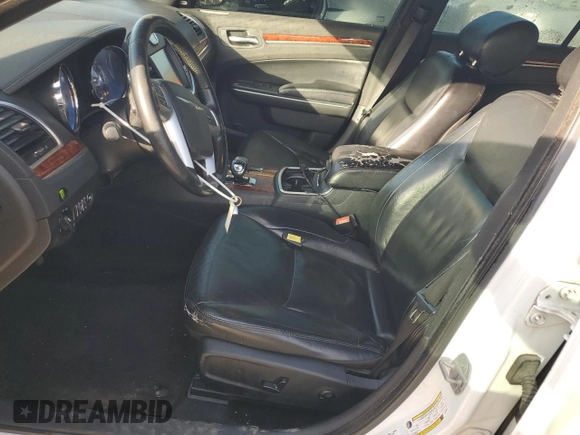 2012 Chrysler 300 Limited with VIN 2C3CCACGXCH216512, listed as a Copart auction lot 54104655 with 228,538 mi miles and Clean Title. Bid and sale history available at DreamBid. Image 7.