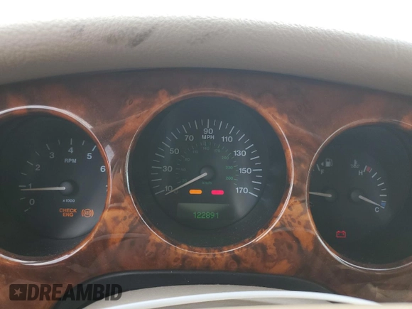 1999 Jaguar XJ z VIN SAJKX6048XC849376, wystawiony jako Copart lot #70538064 z przebiegiem 122 891 mil mil oraz Szkoda całkowita • Salvage title. Historia ofert i sprzedaży dostępna na DreamBid. Obrazek 9.