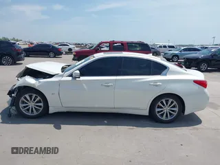 2014 Infiniti Q50 Premium z VIN JN1BV7AP8EM691683, wystawiony jako IAAI lot #42064258 z przebiegiem 146 805 mil mil oraz . Historia ofert i sprzedaży dostępna na DreamBid. Obrazek 15.