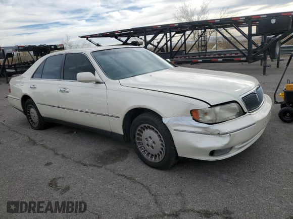 1998 Infiniti Q45 z VIN JNKBY31A8WM403038, wystawiony jako Copart lot #86904484 z przebiegiem 136 142 mil mil oraz Szkoda całkowita • Salvage title. Historia ofert i sprzedaży dostępna na DreamBid. Obrazek 4.