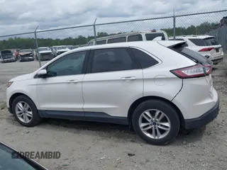 2015 Ford Edge SEL with VIN 2FMTK3J99FBC37403, listed as a IAAI auction lot 41970971 with 136,097 mi miles. Bid and sale history available at carsss.com. Image 14.