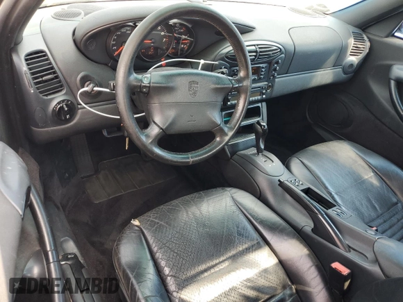1998 Porsche Boxster z VIN WP0CA298XWU622217, wystawiony jako Copart lot #49441925 z przebiegiem 120 638 mil mil oraz Szkoda całkowita • Salvage title. Historia ofert i sprzedaży dostępna na DreamBid. Obrazek 8.