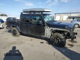 2023 Jeep Gladiator Freedom with VIN 1C6HJTAG5PL512558, listed as a Copart auction lot 45852215 with Not provided miles and Salvage title. Bid and sale history available at DreamBid. Image 4.
