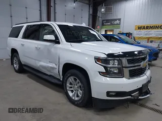 2017 Chevrolet Suburban LT z VIN 1GNSKHKC6HR219715, wystawiony jako IAAI lot #41953189 z przebiegiem 91 873 mil mil oraz . Historia ofert i sprzedaży dostępna na DreamBid. Obrazek 1.