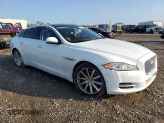 2014 Jaguar XJ Portfolio with VIN SAJWA2GZ3E8V60788, listed as a Copart auction lot 43272405 with 97,196 mi miles and Salvage title. Bid and sale history available at DreamBid. Image 4.