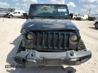 2023 Jeep Wrangler Sport with VIN 1C4HJXAG3PW672856, listed as a Copart auction lot 70444274 with 6,077 mi miles and Salvage title. Bid and sale history available at DreamBid. Image 5.