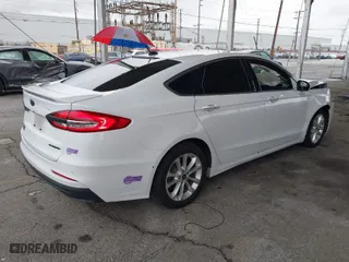 2019 Ford Fusion Energi Titanium with VIN 3FA6P0SU3KR251786, listed as a IAAI auction lot 41798809 with 58,186 mi miles. Bid and sale history available at carsss.com. Image 4.