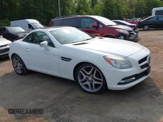 2015 Mercedes-Benz SLK 250 z VIN WDDPK4HA2FF100514, wystawiony jako IAAI lot #42414167 z przebiegiem 120 615 mil mil oraz . Historia ofert i sprzedaży dostępna na DreamBid. Obrazek 1.