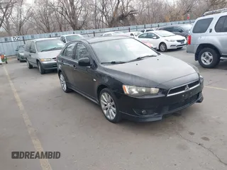 2010 Mitsubishi Lancer GTS with VIN JA32X8HWXAU004111, listed as a IAAI auction lot 41563303 with 198,931 mi miles. Bid and sale history available at carsss.com. Image 1.