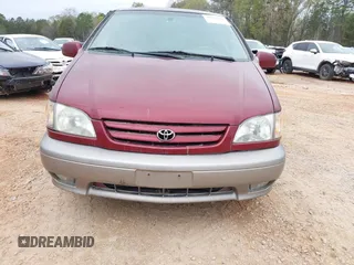 2002 Toyota Sienna LE with VIN 4T3ZF13C12U437425, listed as a IAAI auction lot 41157987 with 200,309 mi miles. Bid and sale history available at carsss.com. Image 6.