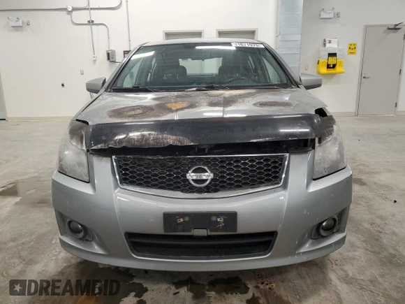 2012 Nissan Sentra SE-R z VIN 3N1BB6AP0CL730938, wystawiony jako Copart lot #51671975 z przebiegiem Nie podano mil oraz Nie do naprawy • Non repairable. Historia ofert i sprzedaży dostępna na DreamBid. Obrazek 5.