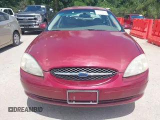 2003 Ford Taurus SES Standard with VIN 1FAFP55U93G244522, listed as a IAAI auction lot 42234122 with 140,850 mi miles and . Bid and sale history available at DreamBid. Image 6.
