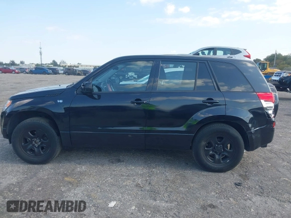 2008 Suzuki Grand Vitara with VIN JS3TE941284102380, listed as a IAAI auction lot 42061609 with 103,554 mi miles and . Bid and sale history available at DreamBid. Image 14.