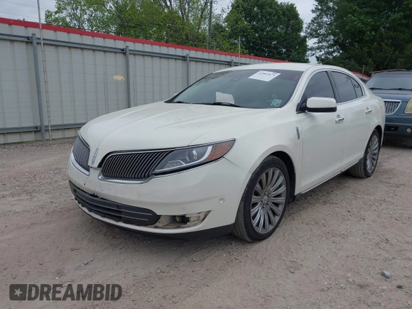 2013 Lincoln MKS with VIN 1LNHL9DKXDG604710, listed as a IAAI auction lot 42001875 with 117,724 mi miles and . Bid and sale history available at DreamBid. Image 2.