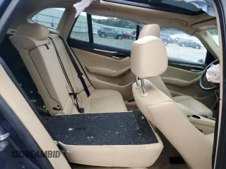 2014 BMW X1 xDrive28i z VIN WBAVL1C5XEVY10401, wystawiony jako Copart lot #72588914 z przebiegiem Nie podano mil oraz Szkody całkowita. Historia ofert i sprzedaży dostępna na DreamBid. Obrazek 11.