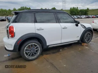 2015 MINI Countryman S with VIN WMWZC5C58FWP46931, listed as a Copart auction lot 59183495 with 105,731 mi miles and Salvage title. Bid and sale history available at DreamBid. Image 3.