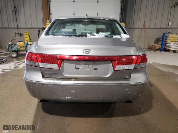 2009 Hyundai Azera GLS with VIN KMHFC46D59A371628, listed as a Copart auction lot 87460584 with 103,077 mi miles and Salvage Title. Bid and sale history available at carsss.com. Image 6.