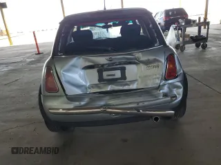 2004 MINI Hardtop with VIN WMWRC33404TJ58046, listed as a Copart auction lot 46358625 with 140,934 mi miles and Salvage Title. Bid and sale history available at DreamBid. Image 6.
