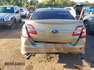 2013 Ford Taurus SEL with VIN 1FAHP2E91DG235771, listed as a IAAI auction lot 40210537 with 179,780 mi miles and . Bid and sale history available at carsss.com. Image 6.