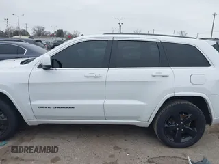 2015 Jeep Grand Cherokee Altitude with VIN 1C4RJEAG2FC901391, listed as a IAAI auction lot 41565763 with 220,685 mi miles. Bid and sale history available at carsss.com. Image 14.