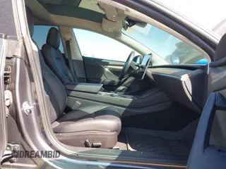 2023 Tesla Model 3 z VIN 5YJ3E1EA2PF404614, wystawiony jako IAAI lot #42009539 z przebiegiem 22 105 mil mil oraz . Historia ofert i sprzedaży dostępna na DreamBid. Obrazek 5.