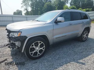 2018 Jeep Grand Cherokee Limited z VIN 1C4RJEBG4JC281330, wystawiony jako Copart lot #57954545 z przebiegiem 63 035 mil mil oraz Szkoda całkowita • Salvage title. Historia ofert i sprzedaży dostępna na DreamBid. Obrazek 1.