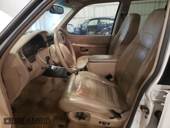 2000 Ford Explorer Eddie Bauer z VIN 1FMDU84P0YZC67167, wystawiony jako Copart lot #85806684 z przebiegiem 156 411 mil mil oraz Szkoda całkowita • Salvage title. Historia ofert i sprzedaży dostępna na DreamBid. Obrazek 7.