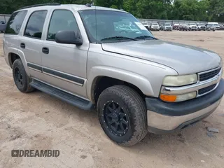 2005 Chevrolet Tahoe LT z VIN 1GNEC13T45J118859, wystawiony jako IAAI lot #42141952 z przebiegiem 282 522 mil mil oraz . Historia ofert i sprzedaży dostępna na DreamBid. Obrazek 1.