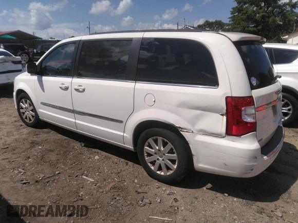 2013 Chrysler Town & Country Touring with VIN 2C4RC1BG1DR721230, listed as a IAAI auction lot 42220816 with 131,645 mi miles and . Bid and sale history available at DreamBid. Image 3.