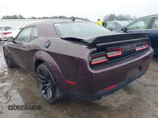 2021 Dodge Challenger R/T Scat Pack z VIN 2C3CDZFJ2MH586535, wystawiony jako IAAI lot #41224949 z przebiegiem 32 977 mil mil oraz . Historia ofert i sprzedaży dostępna na DreamBid. Obrazek 3.