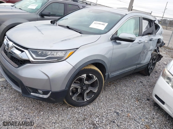 2019 Honda CR-V Touring with VIN 7FARW1H9XKE011269, listed as a IAAI auction lot 41258386 with 53,184 mi miles. Bid and sale history available at carsss.com. Image 2.