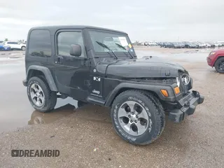 2004 Jeep Wrangler X with VIN 1J4FA39S34P753865, listed as a IAAI auction lot 41948545 with 198,169 mi miles. Bid and sale history available at carsss.com. Image 1.