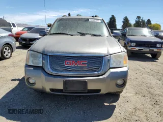 2006 GMC Envoy XL Denali with VIN 1GKET66M566114516, listed as a Copart auction lot 68332374 with 186,959 mi miles and Salvage Title. Bid and sale history available at carsss.com. Image 5.