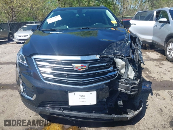 2017 Cadillac XT5 Luxury FWD z VIN 1GYKNBRS7HZ227732, wystawiony jako IAAI lot #42035099 z przebiegiem 76 260 mil mil oraz . Historia ofert i sprzedaży dostępna na DreamBid. Obrazek 6.