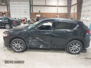 2024 Mazda CX-5 2.5 S Premium Package with VIN JM3KFBDMXR0351289, listed as a IAAI auction lot 41657792 with 22,260 mi miles. Bid and sale history available at carsss.com. Image 14.