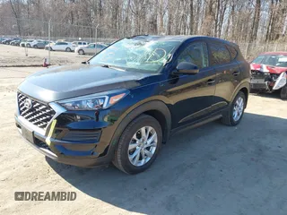 2019 Hyundai Tucson SE with VIN KM8J2CA46KU073107, listed as a IAAI auction lot 41648453 with 58,417 mi miles. Bid and sale history available at carsss.com. Image 17.
