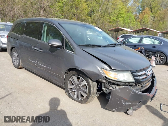 2014 Honda Odyssey Touring with VIN 5FNRL5H92EB073085, listed as a IAAI auction lot 42065913 with 120,834 mi miles and . Bid and sale history available at DreamBid. Image 1.