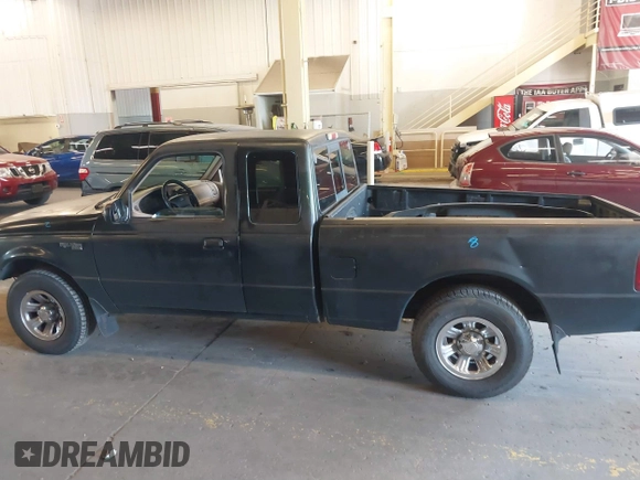 2001 Ford Ranger XLT Appearance with VIN 1FTYR14E51PA38398, listed as a IAAI auction lot 40142183 with 220,681 mi miles. Bid and sale history available at carsss.com. Image 14.
