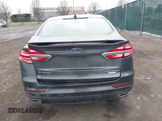 2019 Ford Fusion Titanium with VIN 3FA6P0K9XKR259556, listed as a IAAI auction lot 41823997 with 132,071 mi miles. Bid and sale history available at carsss.com. Image 16.