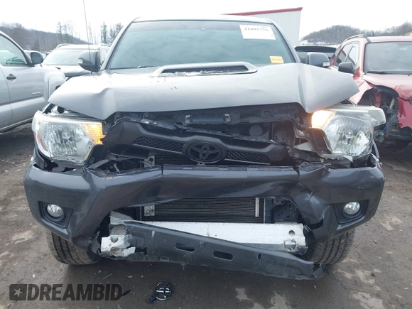 2014 Toyota Tacoma with VIN 3TMLU4EN1EM148353, listed as a IAAI auction lot 41602756 with 89,563 mi miles. Bid and sale history available at carsss.com. Image 6.