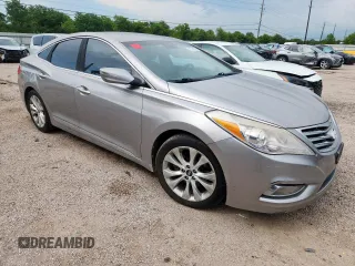 2013 Hyundai Azera z VIN KMHFG4JG9DA217664, wystawiony jako Copart lot #60855945 z przebiegiem 115 623 mil mil oraz Czysty tytuł • Clean title. Historia ofert i sprzedaży dostępna na DreamBid. Obrazek 4.