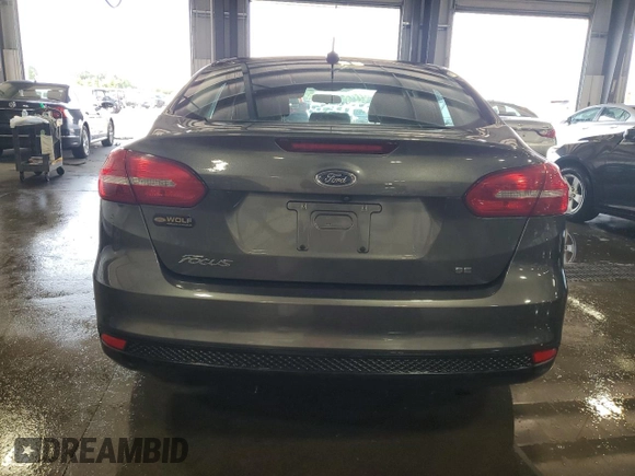2017 Ford Focus SE with VIN 1FADP3F21HL205754, listed as a Copart auction lot 67166984 with 83,617 mi miles and Salvage title. Bid and sale history available at DreamBid. Image 6.